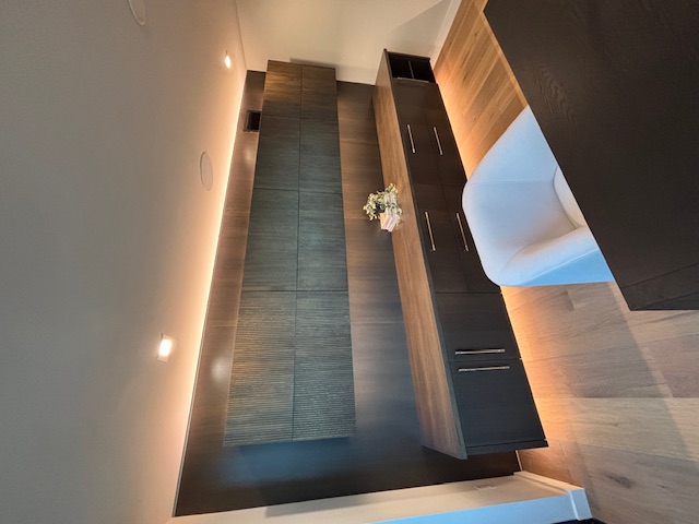 Custom office cabinetry with lighting by JSG Cabinets
